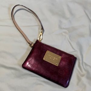 Michael Kors wristlet wallet colorburgundy/purple